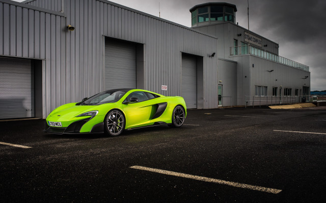Green sports car hangar cloudy free wallpaper - medium preview image