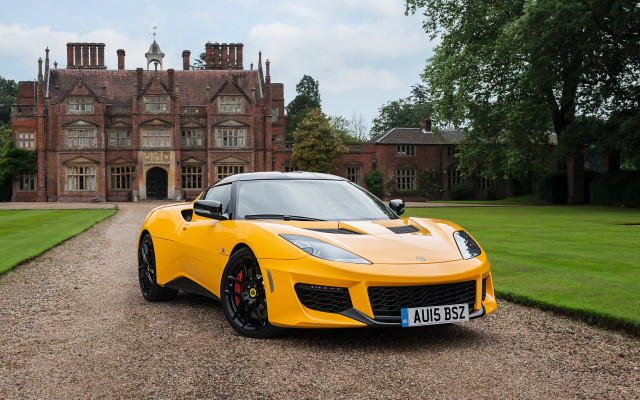 Yellow sports car building driveway #2 free wallpaper - medium preview image