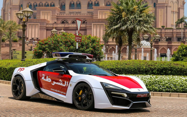 White red sports car clocktower free wallpaper - medium preview image