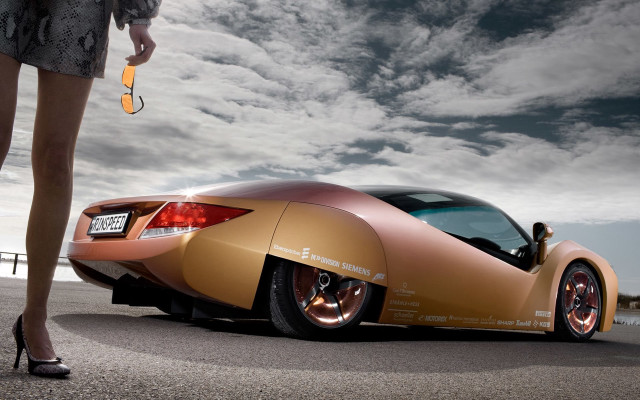 Woman goldcar highheels cloudyroad panpfuturism free wallpaper - medium preview image