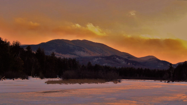 Sunset mountain range snowy field free wallpaper - medium preview image