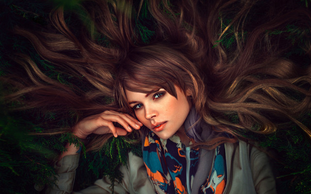 Woman longhair laying blowing wind free wallpaper - medium preview image