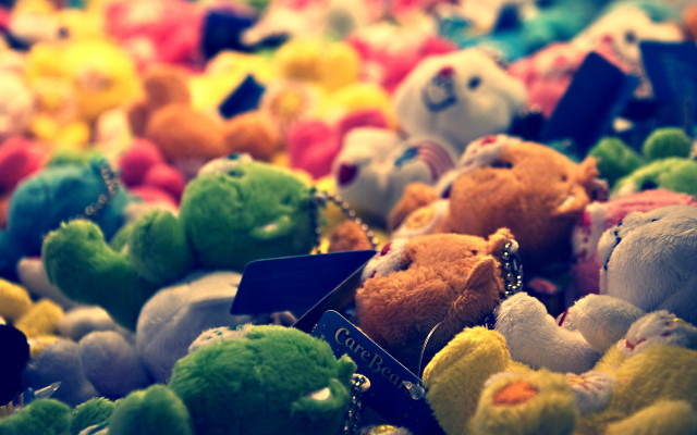 Stuffed animals table top bokeh free wallpaper - medium preview image