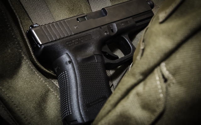 Gun backpack layered precisionism fishnets free wallpaper - medium preview image