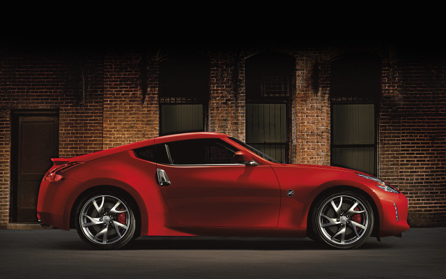 Red sports car brick building #4 free wallpaper - medium preview image