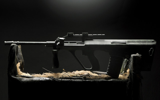 Gun fur covered table dark free wallpaper - medium preview image