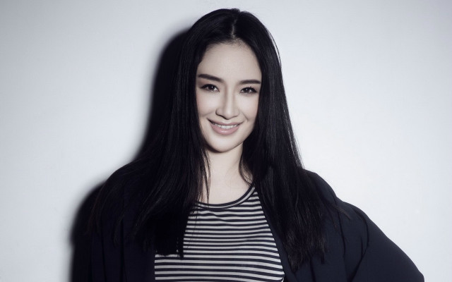 Woman black hair striped shirt free wallpaper - medium preview image
