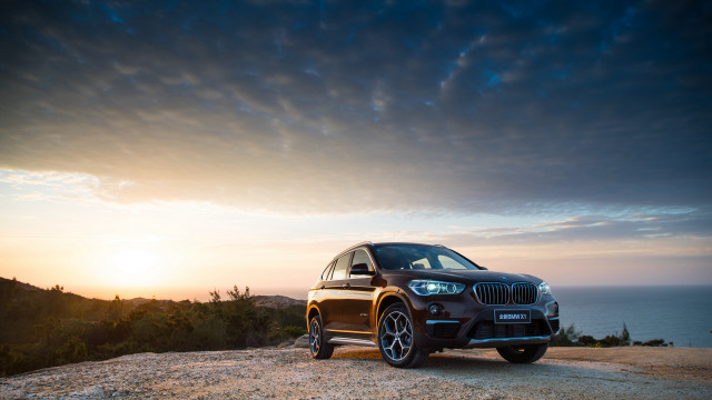 Black bmw suv ocean sunset free wallpaper - medium preview image