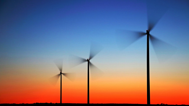 Wind turbines sunset blue sky free wallpaper - medium preview image