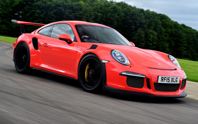Red porsche sports car driving free wallpaper - medium preview image