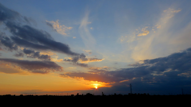 Sunset clouds cityscape horizon ocean free wallpaper - medium preview image