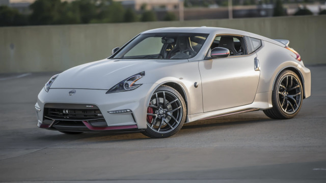 White sports car parking lot #6 free wallpaper - medium preview image