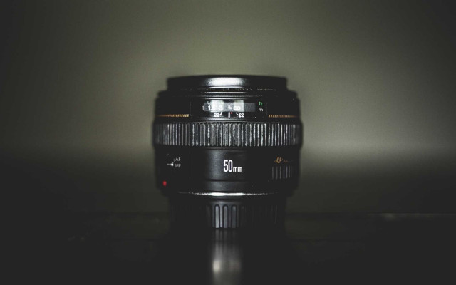 Camera lens table dark light free wallpaper - medium preview image