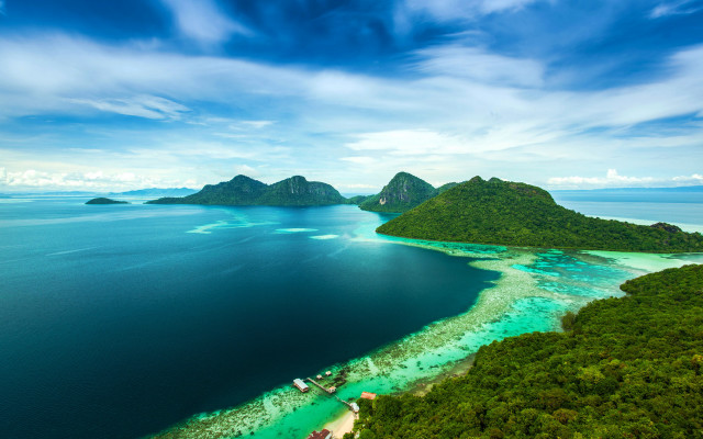 Tropical island lagoon boat sky free wallpaper - medium preview image
