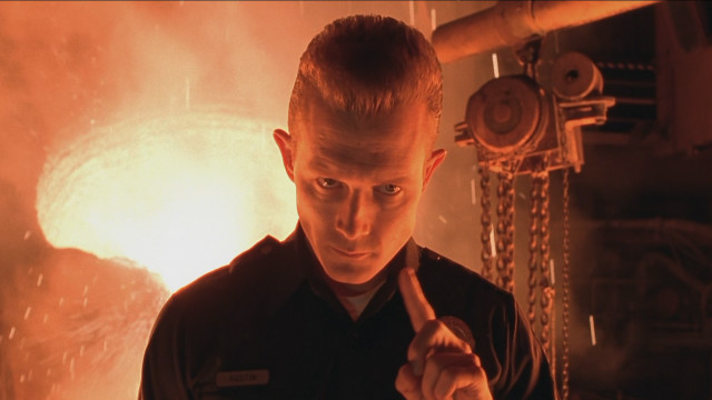 Man black shirt metal object free wallpaper - medium preview image