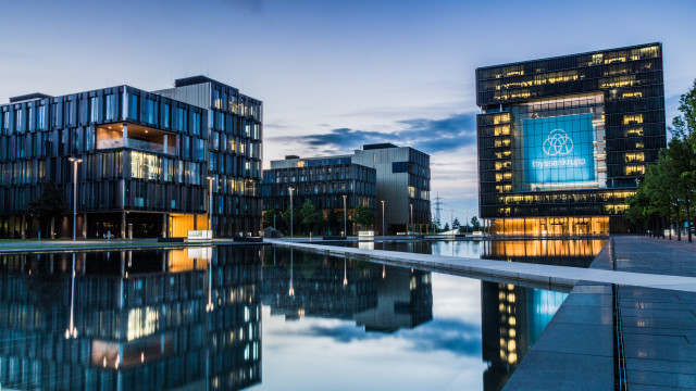 Building water reflection dusk cityscape free wallpaper - medium preview image