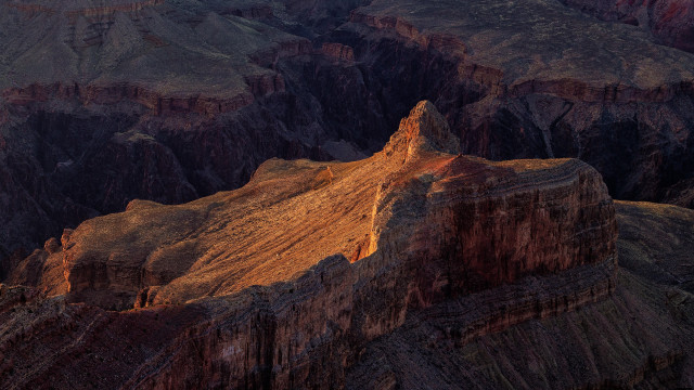 Mountain range cliffs dramatic light free wallpaper - medium preview image