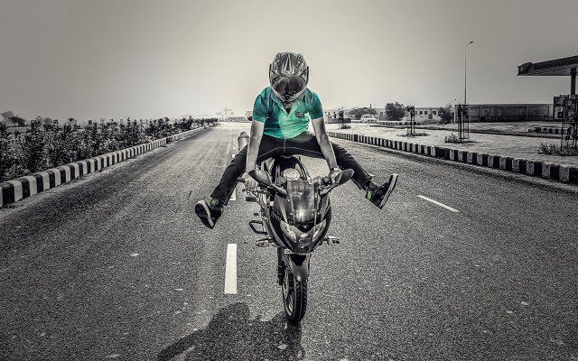 Motorcycle rider urban skyline trees free wallpaper - medium preview image