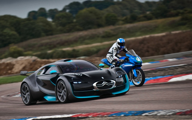 Motorcycle racecar motion blur mountain free wallpaper - medium preview image