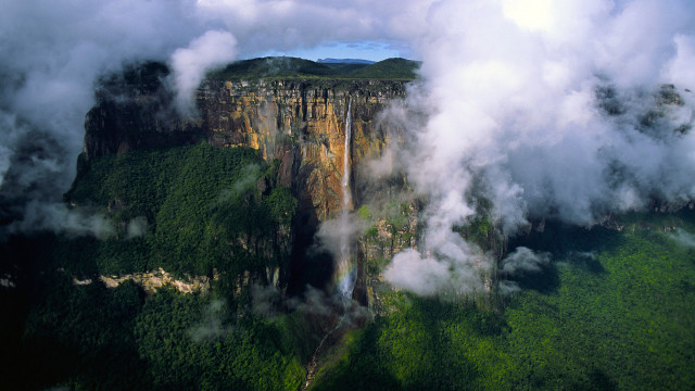 Mountain cliff clouds waterfall forest free wallpaper - medium preview image