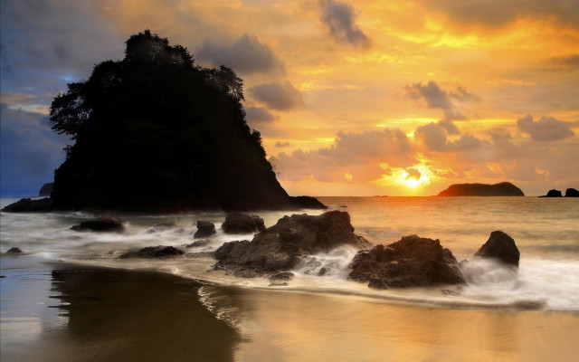 Sunset rocky beach waves lighthouse free wallpaper - medium preview image