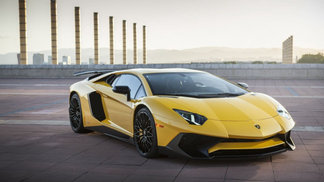 Yellow sports car parking lot #12 free wallpaper - medium preview image