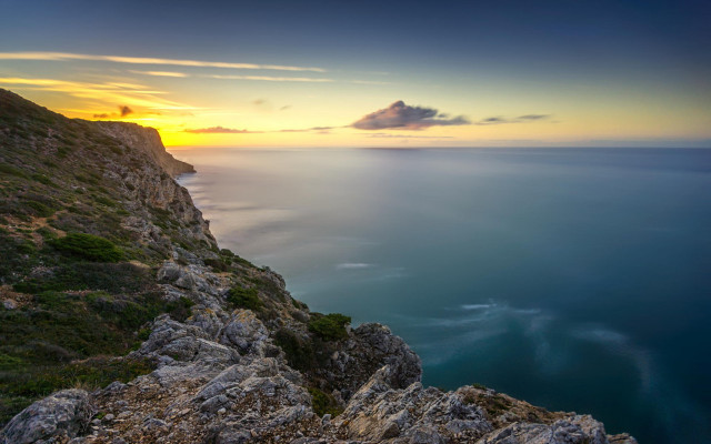Sunset rocky cliff water mountain free wallpaper - medium preview image