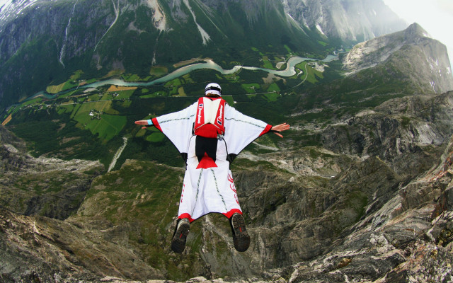 Flying person white red mountain free wallpaper - medium preview image