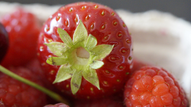 Strawberries raspberries bowl leaf macro free wallpaper - medium preview image