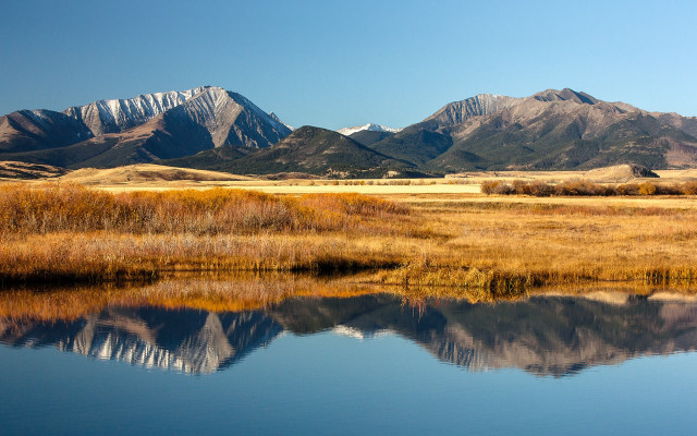 Mountain range lake grassy field free wallpaper - medium preview image
