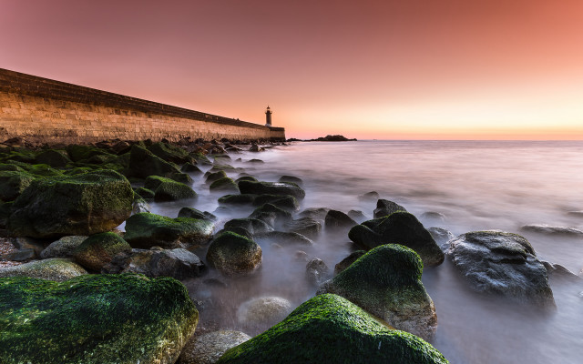 Lighthouse mossy rocks red sky free wallpaper - medium preview image