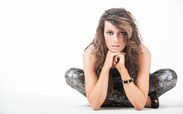 Woman sitting portrait brown hair free wallpaper - medium preview image