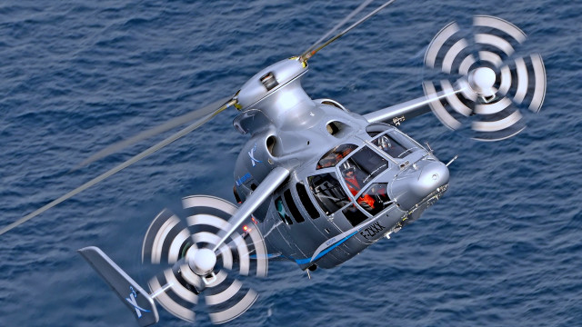 Helicopter ocean man cockpit urban free wallpaper - medium preview image
