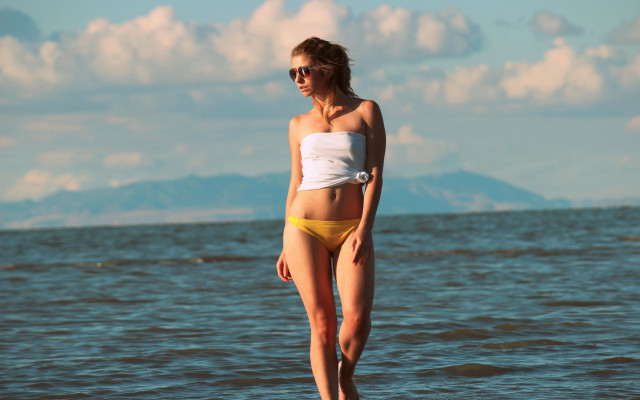 Woman bikini surfboard mountain ocean free wallpaper - medium preview image