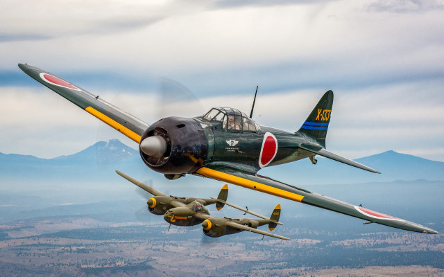 Planes mountains clouds sky puzzle free wallpaper - medium preview image