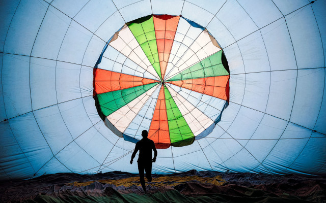 Man parachute fence rooftop tiles free wallpaper - medium preview image