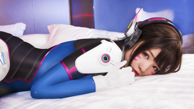 Cat suit woman bed stuffed free wallpaper - medium preview image