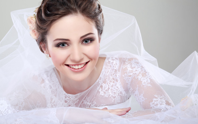 Bride smiling in white dress free wallpaper - medium preview image