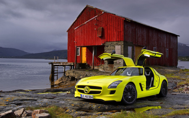 Yellow car red building open free wallpaper - medium preview image