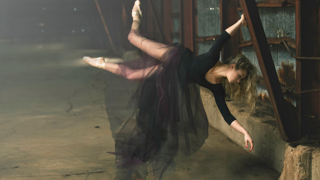 Woman black dress leaning arabesque free wallpaper - medium preview image