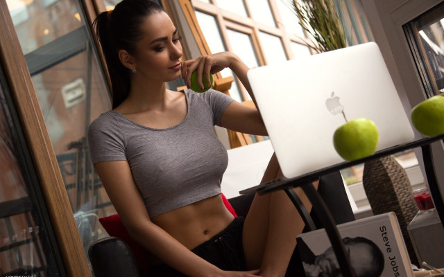 Woman sitting laptop apple graphics free wallpaper - medium preview image