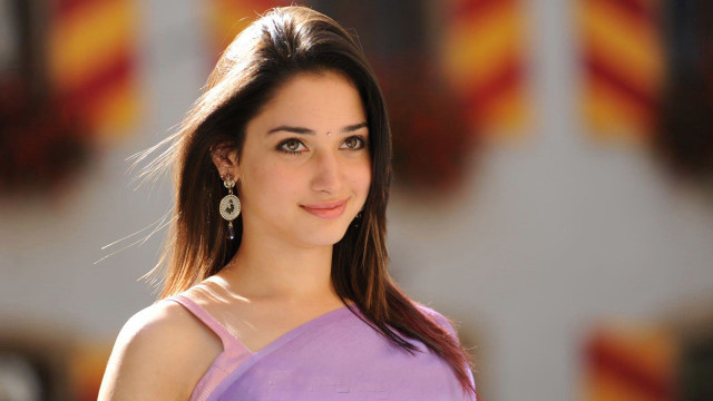 Woman purple dress posing wall free wallpaper for desktop - medium preview image