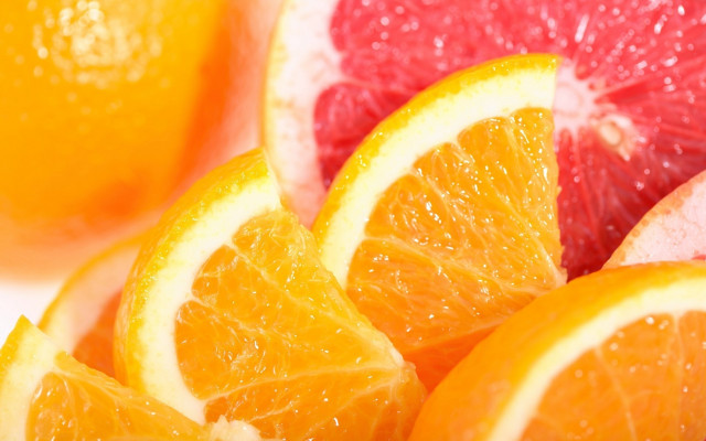Oranges grapefruits water droplets arcimboldo free wallpaper - medium preview image