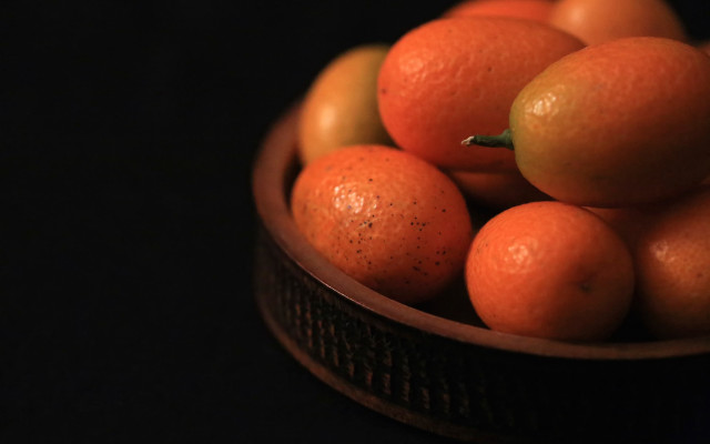 Bowl oranges tabletop black background free wallpaper - medium preview image
