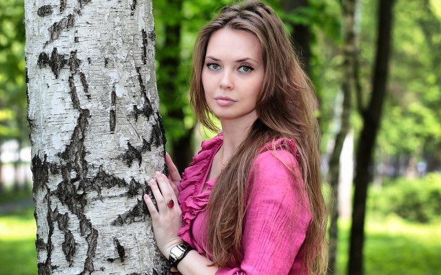 Woman pink shirt tree park free wallpaper - medium preview image