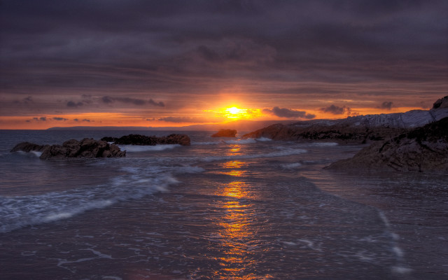 Sunset ocean waves rock formation free wallpaper - medium preview image