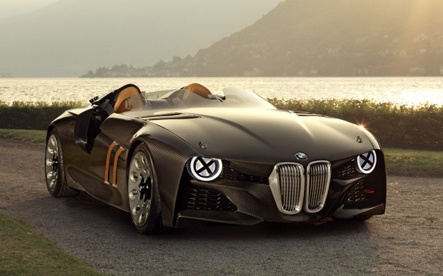Brown car lake mountains sunshine free wallpaper - medium preview image