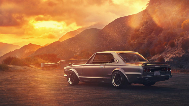 Car mountains sunset surfboard backlit free wallpaper - medium preview image
