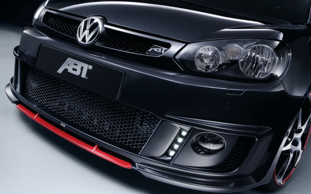 Black car red stripe closeup free wallpaper - medium preview image