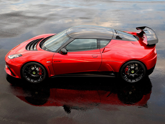 Red sports car wet ground free wallpaper - medium preview image
